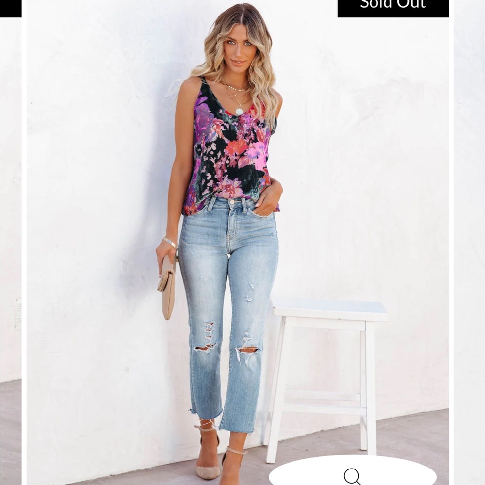 Beautifully colored new velvety top. Size XS. No tags but never been worn.